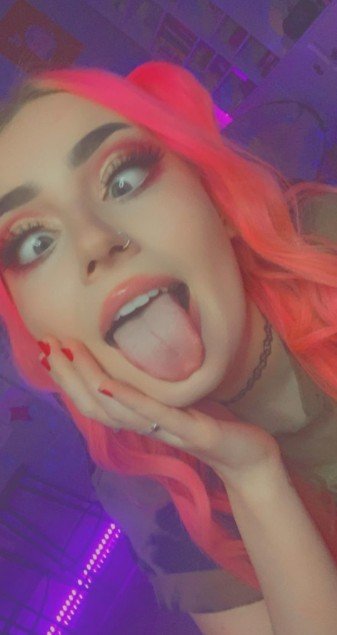 Orange hair and nose piercing