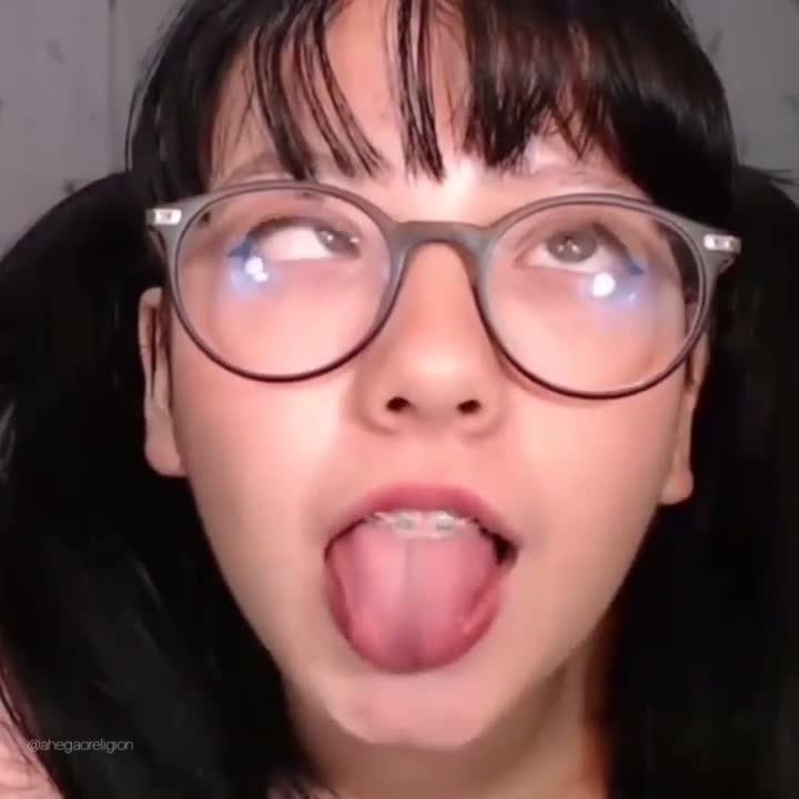 Nerd whore makes ahegao face