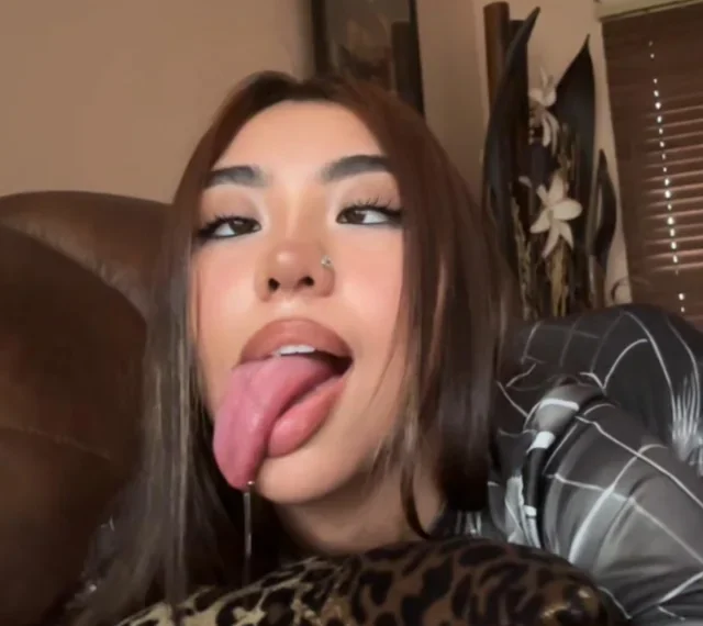 Asian Shows Big Tongue